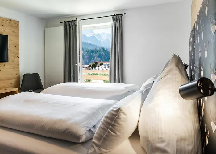Haus Alpspitzchalet 32 Hébergement de vacances Garmisch-Partenkirchen